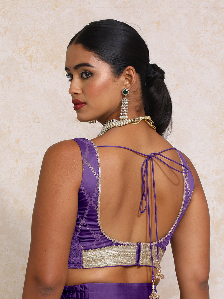 Liyana x Tyohaar Saree Blouse, in Purple Viscose Silk Brocade, featuring sleeveless and curved v-neckline (view 2).