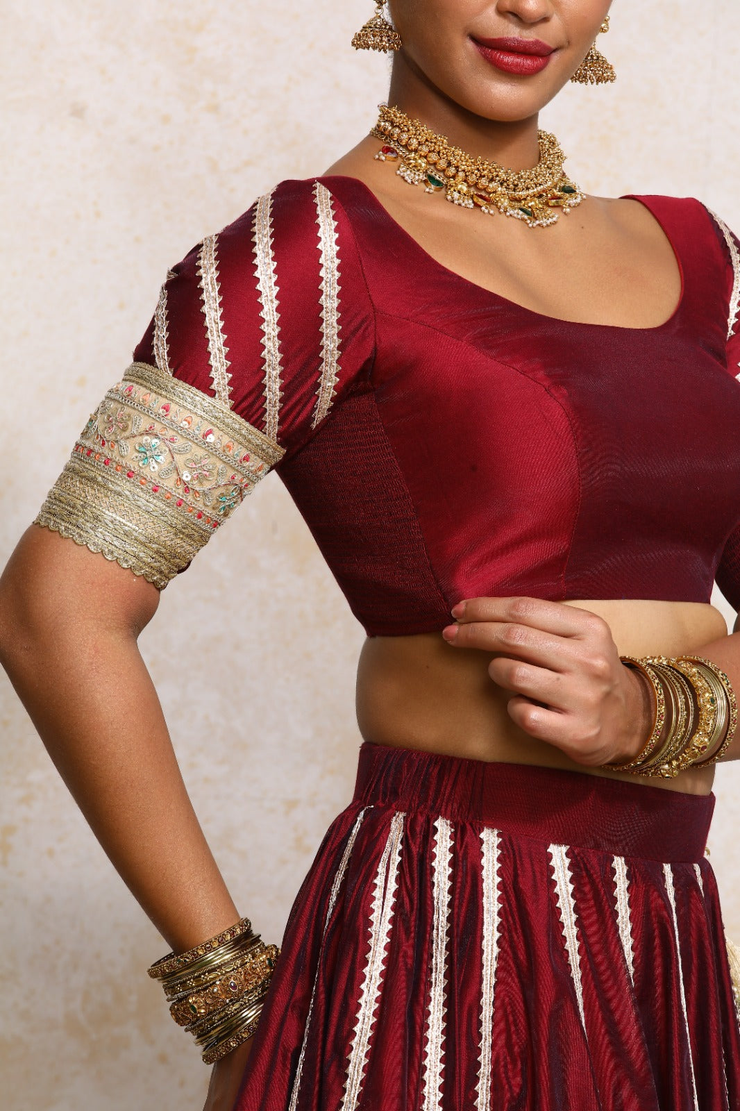 Manika x Tyohaar Saree Blouse, in Maroon Chandheri, featuring elbow sleeves and scoop neckline, made for party & festive.