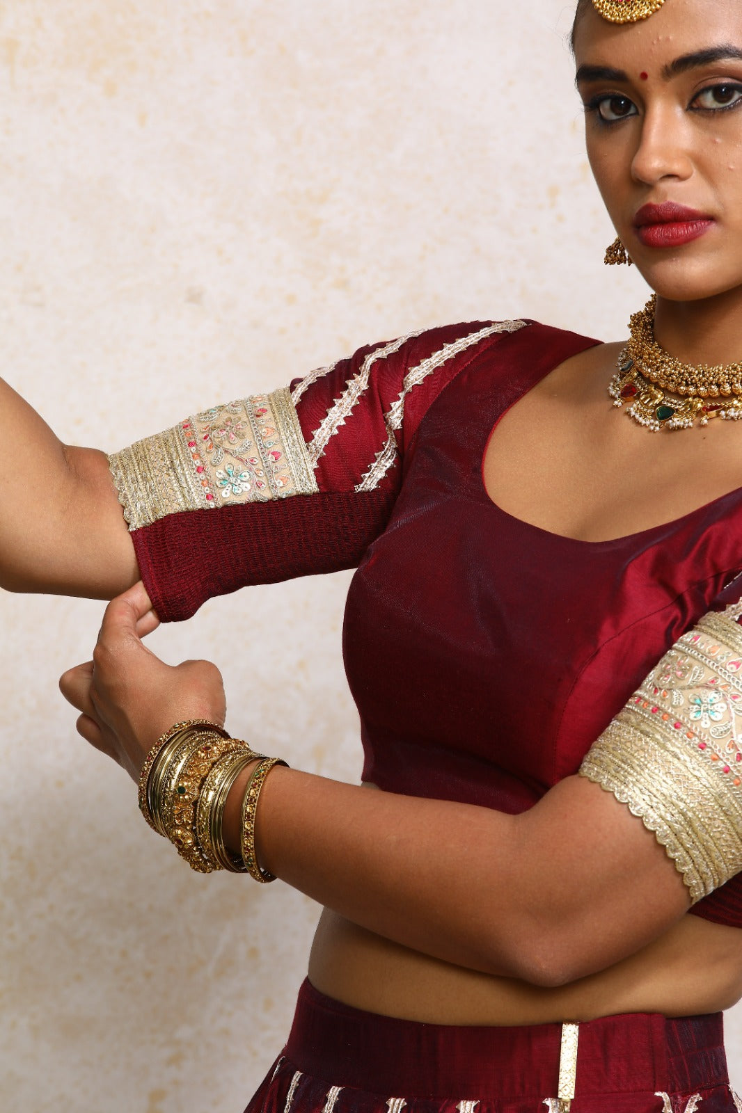 Manika x Tyohaar Saree Blouse, in Maroon Chandheri, featuring elbow sleeves and scoop neckline, made for party & festive.