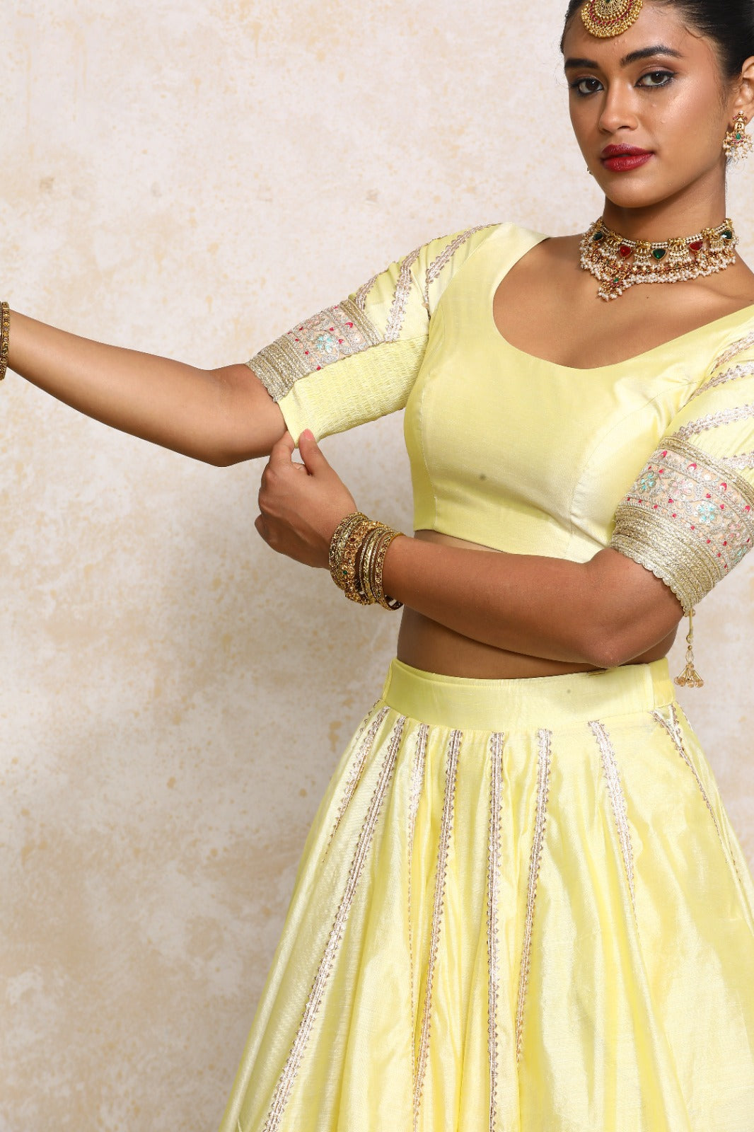Manika x Tyohaar Saree Blouse, in Yellow Chandheri, featuring elbow sleeves and scoop neckline, made for party & festive.