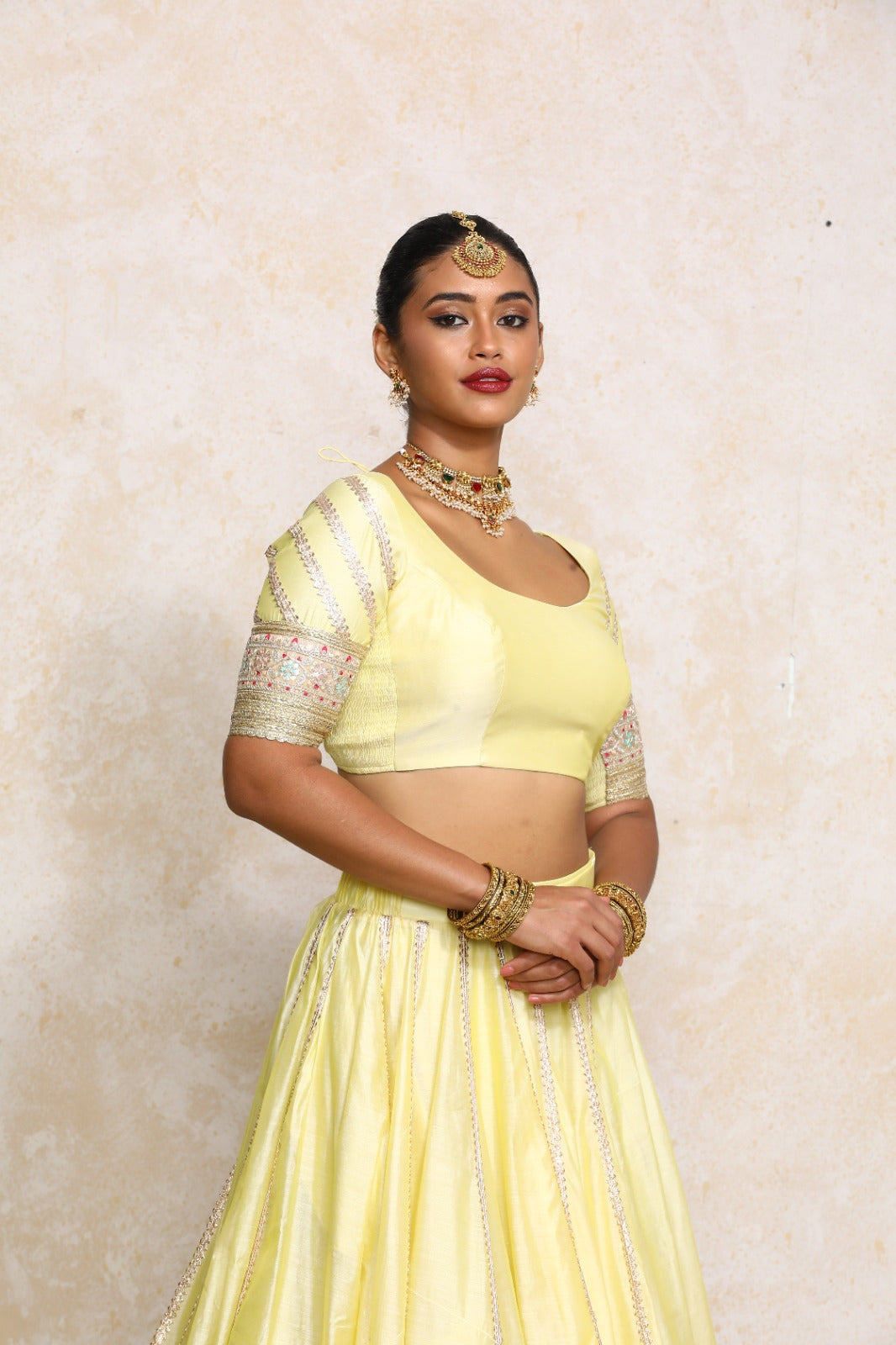 Manika x Tyohaar Saree Blouse, in Yellow Chandheri, featuring elbow sleeves and scoop neckline, made for party & festive.