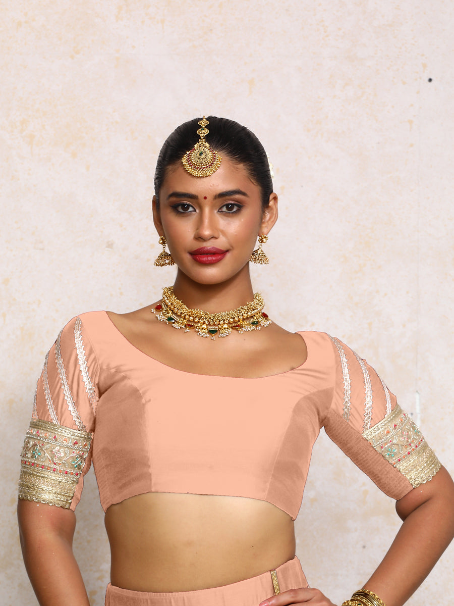Manika x Tyohaar Saree Blouse, in Peach Chandheri, featuring elbow sleeves and scoop neckline, made for party & festive.
