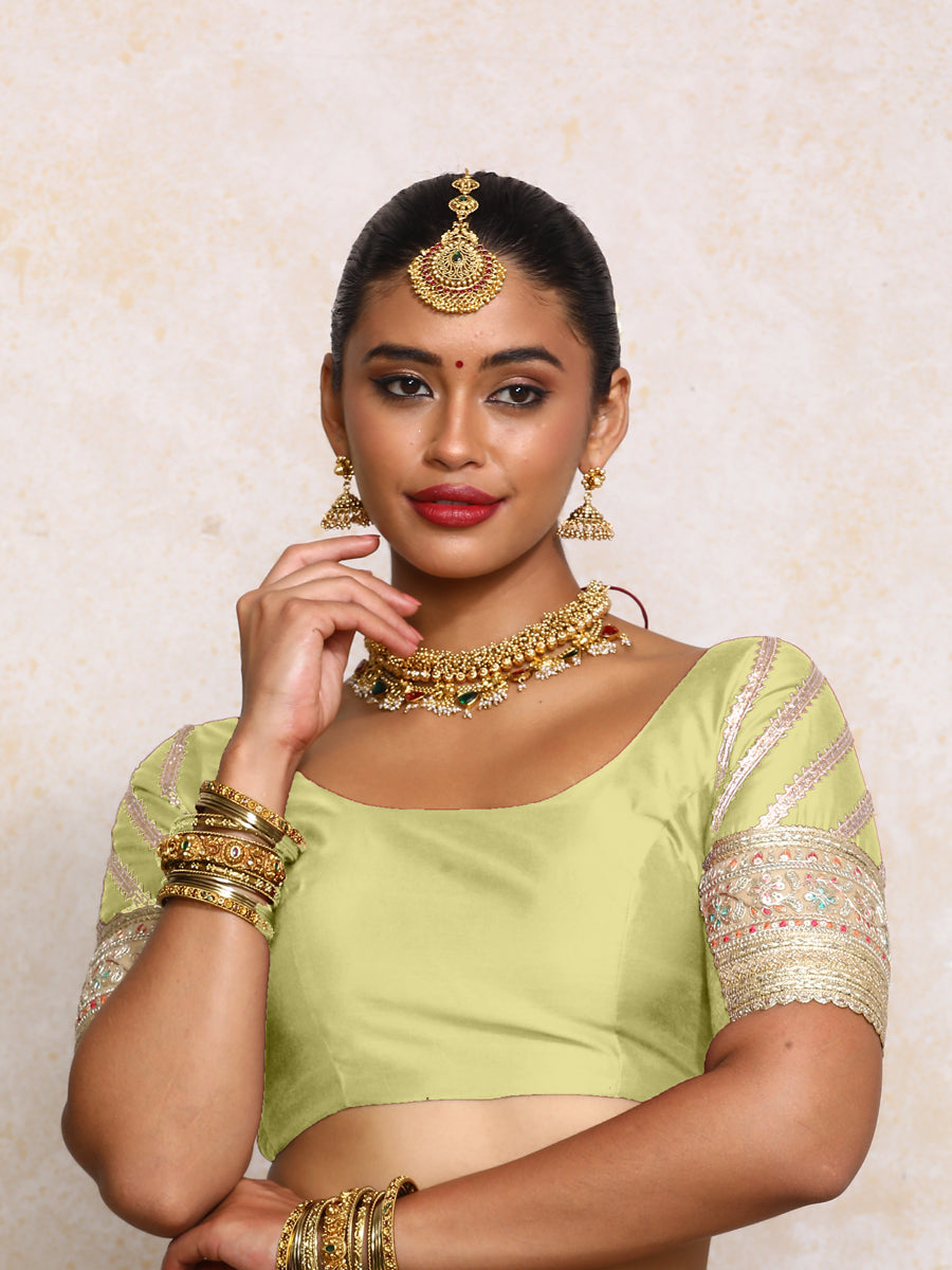 Manika x Tyohaar Saree Blouse, in Green Chandheri, featuring elbow sleeves and scoop neckline, made for party & festive.