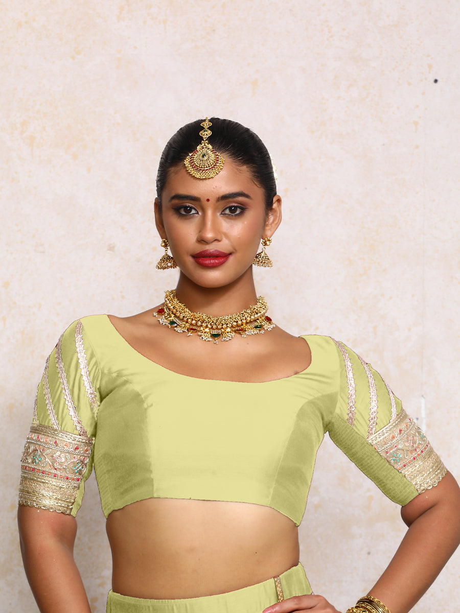 Manika x Tyohaar Saree Blouse, in Green Chandheri, featuring elbow sleeves and scoop neckline, made for party & festive.