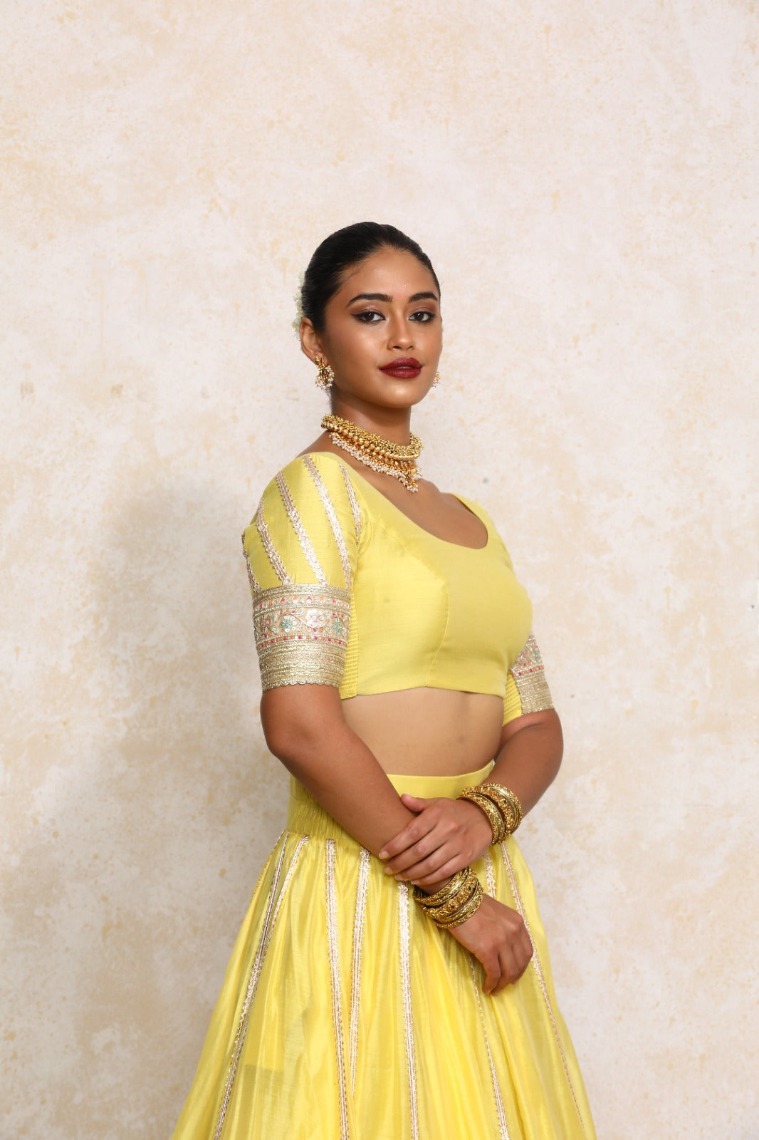 Manika x Tyohaar Saree Blouse, in Yellow Chandheri, featuring elbow sleeves and scoop neckline, made for party & festive.