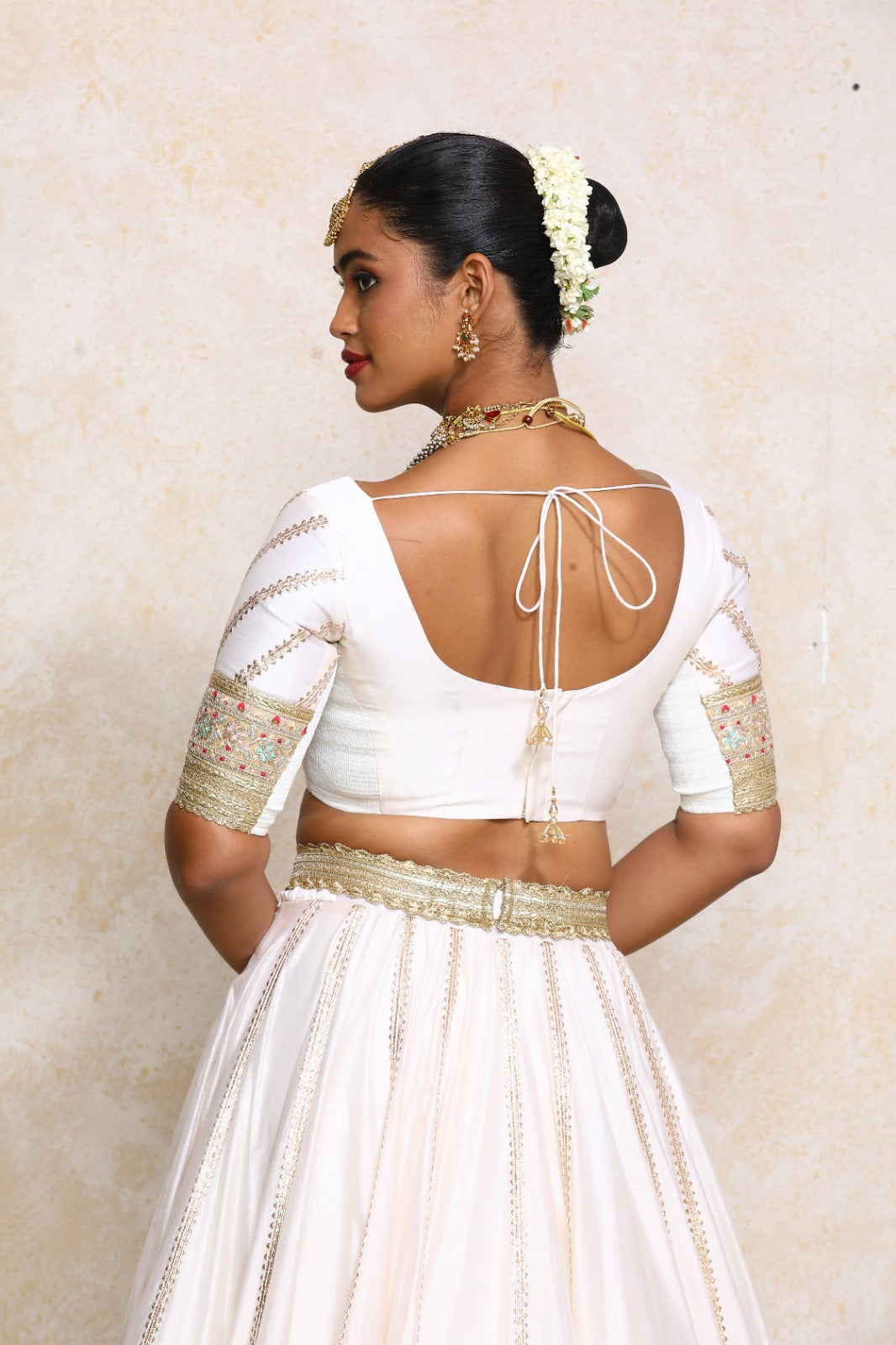 Manika x Tyohaar Saree Blouse, in White Chandheri, featuring elbow sleeves and scoop neckline, made for party & festive.