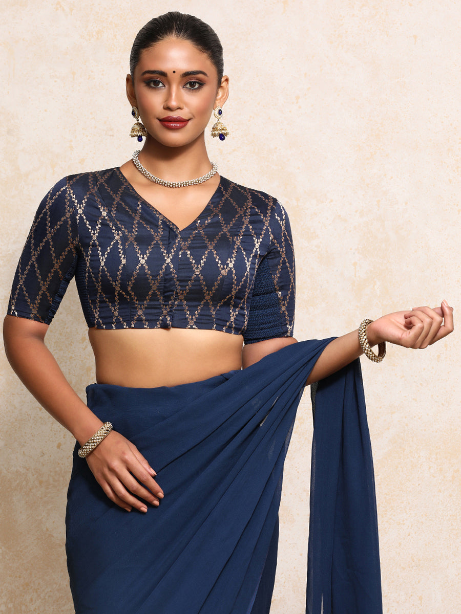 Manisha x Tyohaar Saree Blouse, in Blue Viscose Silk Brocade, featuring elbow sleeves and v-neckline (view 5).