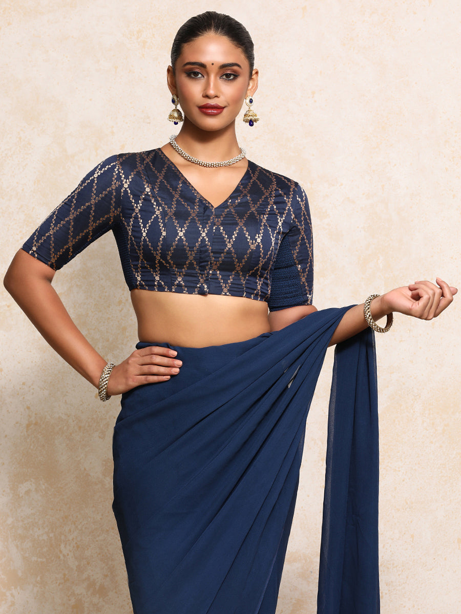 Manisha x Tyohaar Saree Blouse, in Blue Viscose Silk Brocade, featuring elbow sleeves and v-neckline (view 7).
