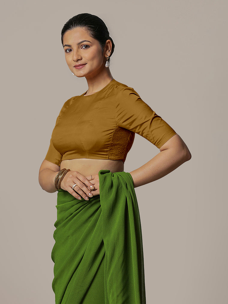 Myra x Rozaana Saree Blouse, in Gold Vegan Silk, featuring elbow sleeves and jewel neckline, made for party & festive.