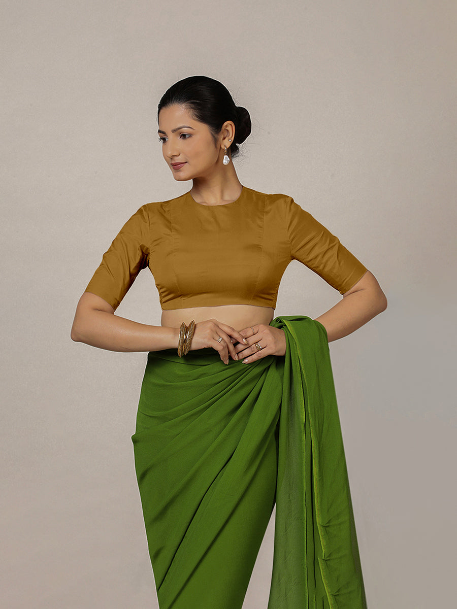 Myra x Rozaana Saree Blouse, in Gold Vegan Silk, featuring elbow sleeves and jewel neckline, made for party & festive (view 8).