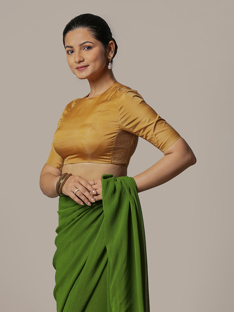 Myra x Rozaana Saree Blouse, in Gold Vegan Silk, featuring elbow sleeves and jewel neckline, made for party & festive (view 6).