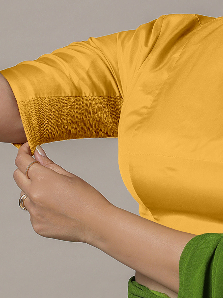 Myra x Rozaana Saree Blouse, in Yellow Artificial Silk, featuring elbow sleeves and jewel neckline, made for party & festive.