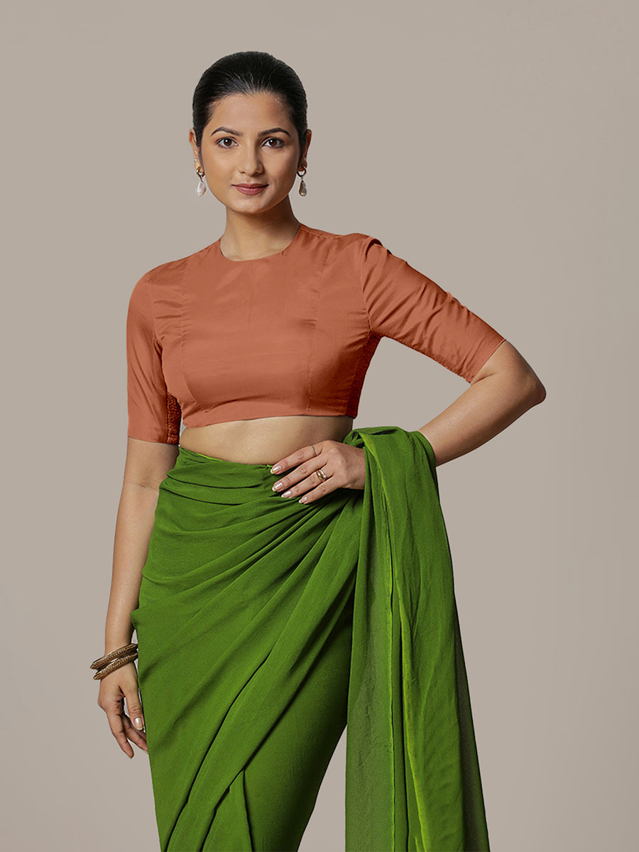 Myra x Rozaana Saree Blouse, in Copper Vegan Silk, featuring elbow sleeves and jewel neckline, made for party & festive.