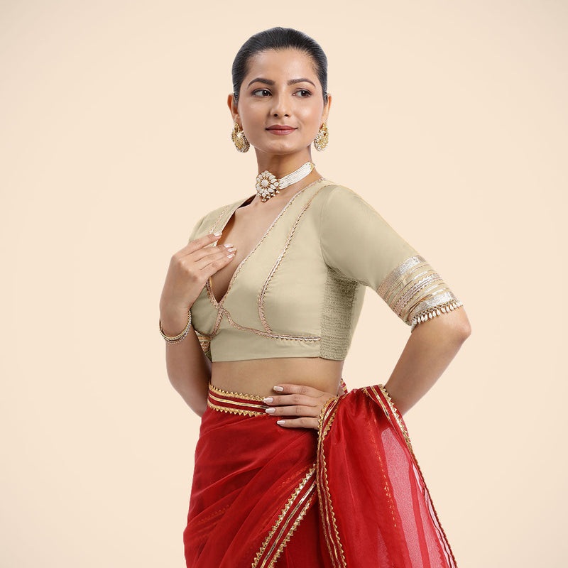 Nafeeza x Tyohaar | Cream Embellished Elbow Sleeves FlexiFit™ Saree Blouse with Plunging V Neckline with Tasteful Golden Gota Lace-Binks
