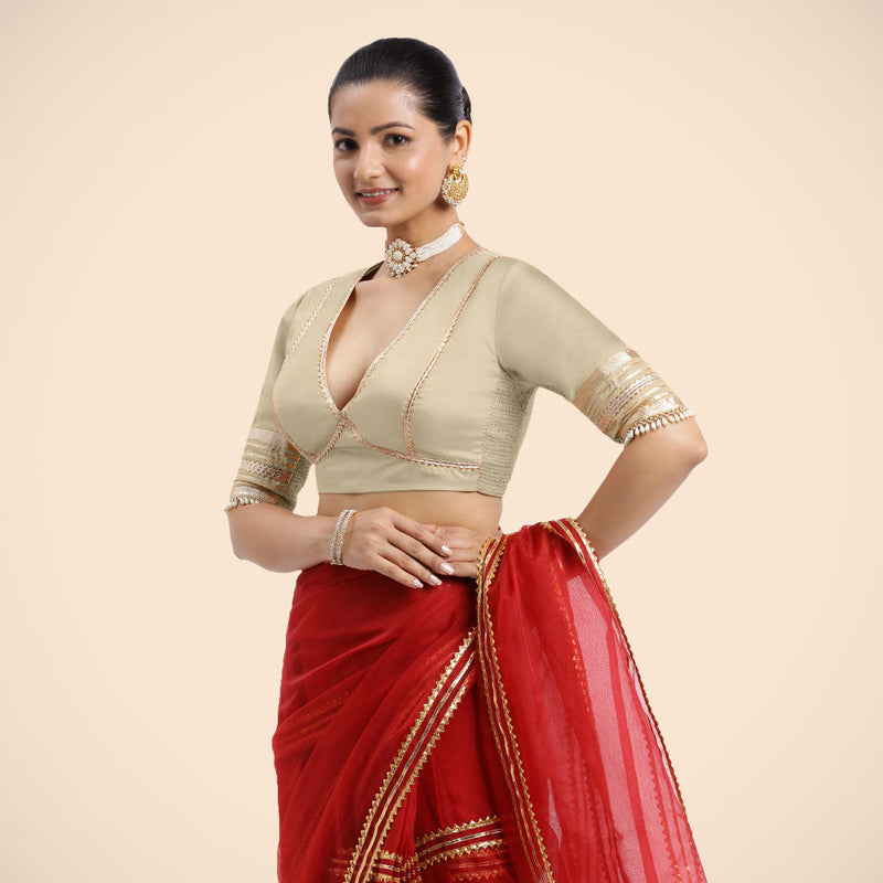 Nafeeza x Tyohaar | Cream Embellished Elbow Sleeves FlexiFit™ Saree Blouse with Plunging V Neckline with Tasteful Golden Gota Lace-Binks