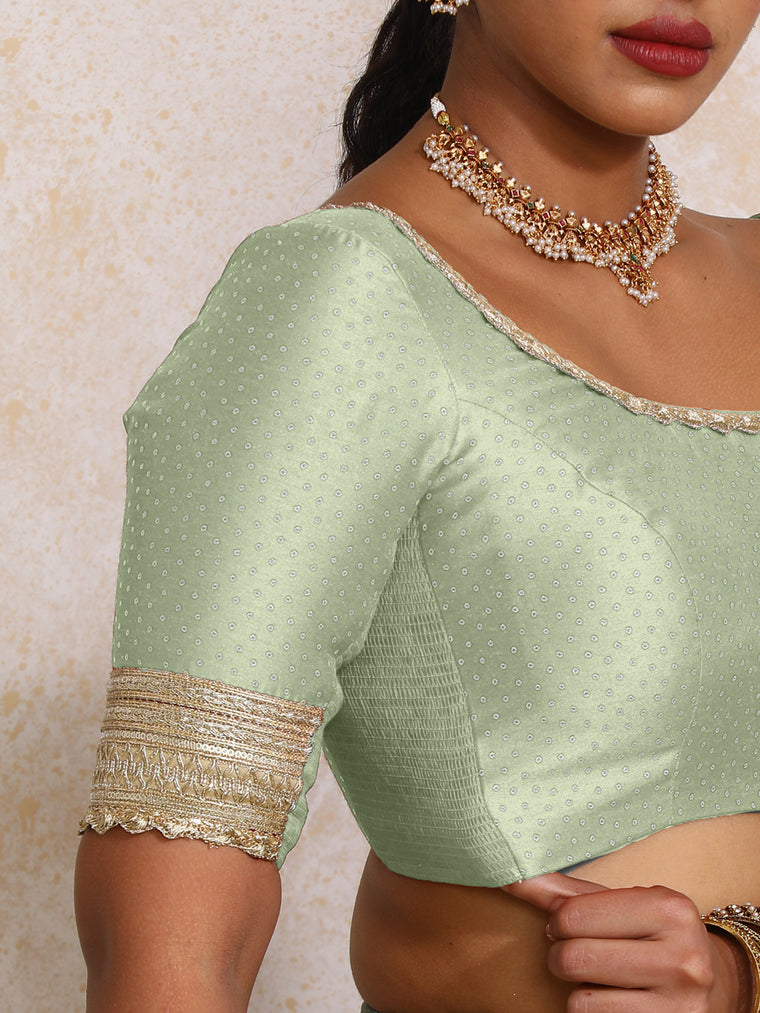Navika x Tyohaar Saree Blouse, in Green Chandheri, featuring elbow sleeves and scoop neckline, made for party & festive.