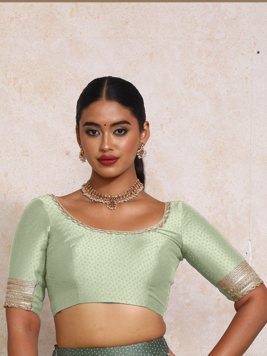 Navika x Tyohaar Saree Blouse, in Green Chandheri, featuring elbow sleeves and scoop neckline, made for party & festive.