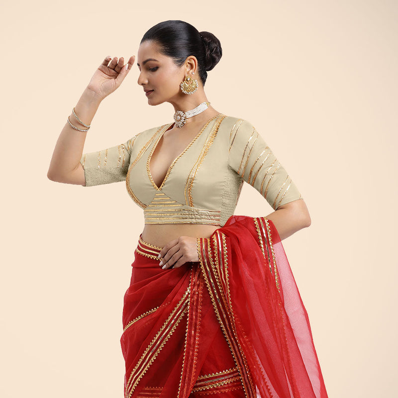 Navya x Tyohaar | Cream Elbow Sleeves FlexiFit™ Saree Blouse with Plunging V Neckline with Tasteful Golden Gota Lace-Binks