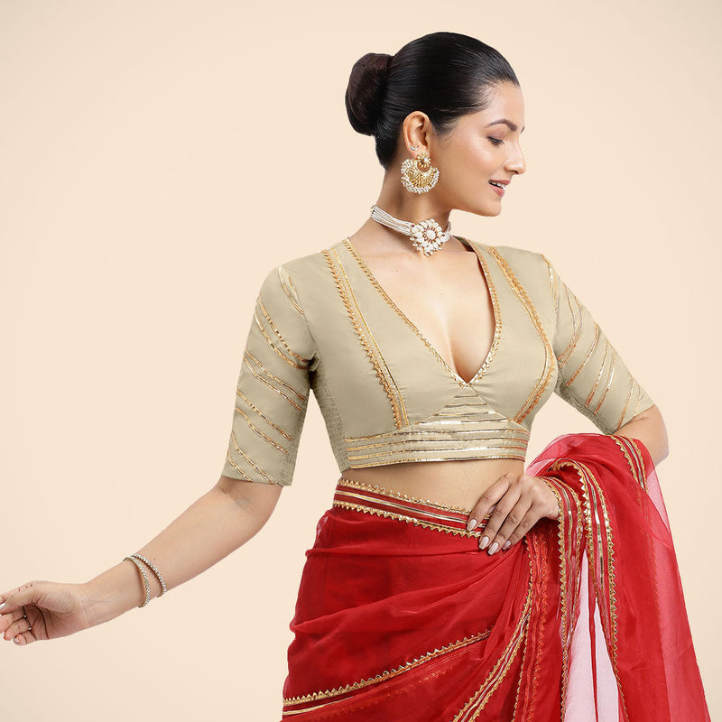 Navya x Tyohaar | Cream Elbow Sleeves FlexiFit™ Saree Blouse with Plunging V Neckline with Tasteful Golden Gota Lace-Binks