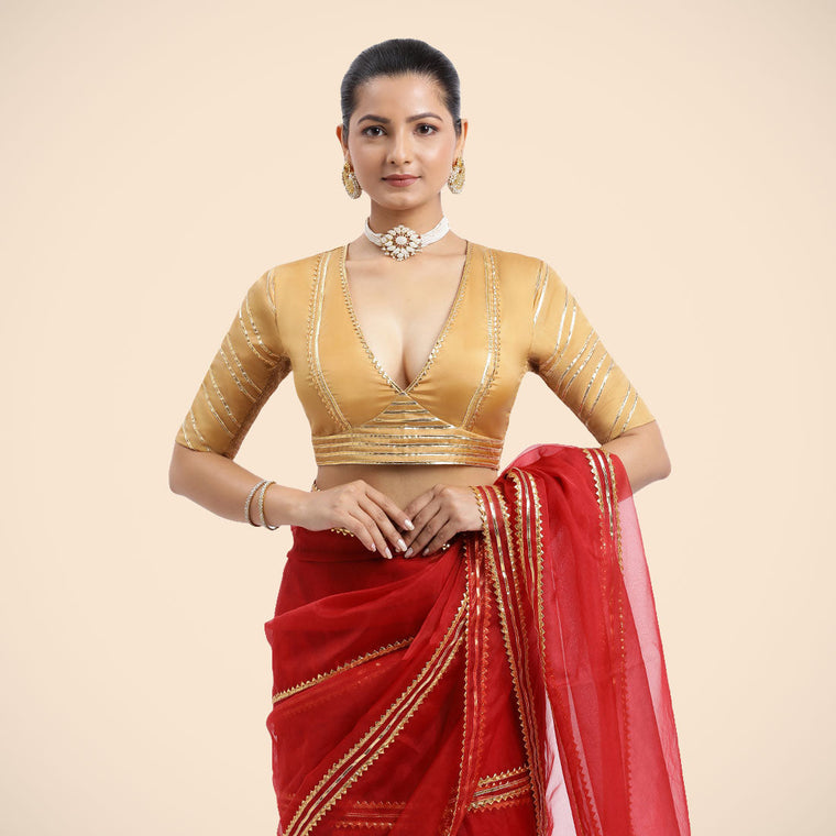 Navya x Tyohaar Saree Blouse, in Gold Vegan Silk, featuring elbow sleeves and v-neckline, made for party & festive.