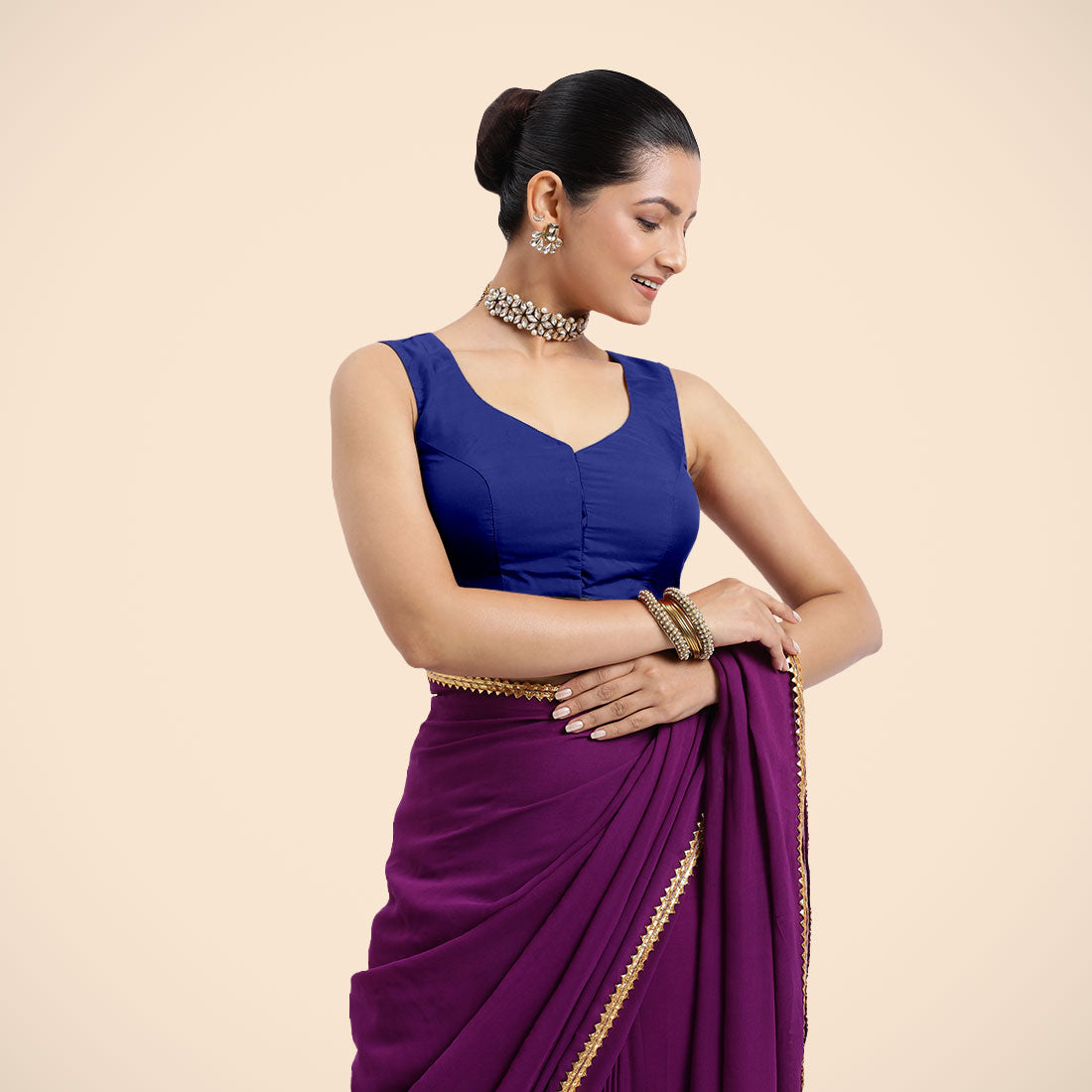 Nazia x Rozaana Saree Blouse, in Blue Vegan Silk, featuring sleeveless and curved v-neckline, made for daily & work (view 8).