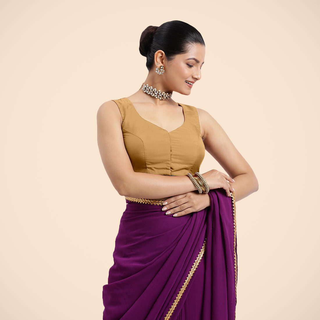 Nazia x Rozaana Saree Blouse, in Gold Vegan Silk, featuring sleeveless and curved v-neckline, made for daily & work (view 8).