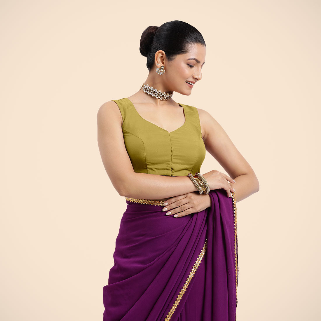 Nazia x Rozaana Saree Blouse, in Yellow Vegan Silk, featuring sleeveless and curved v-neckline, made for daily & work.