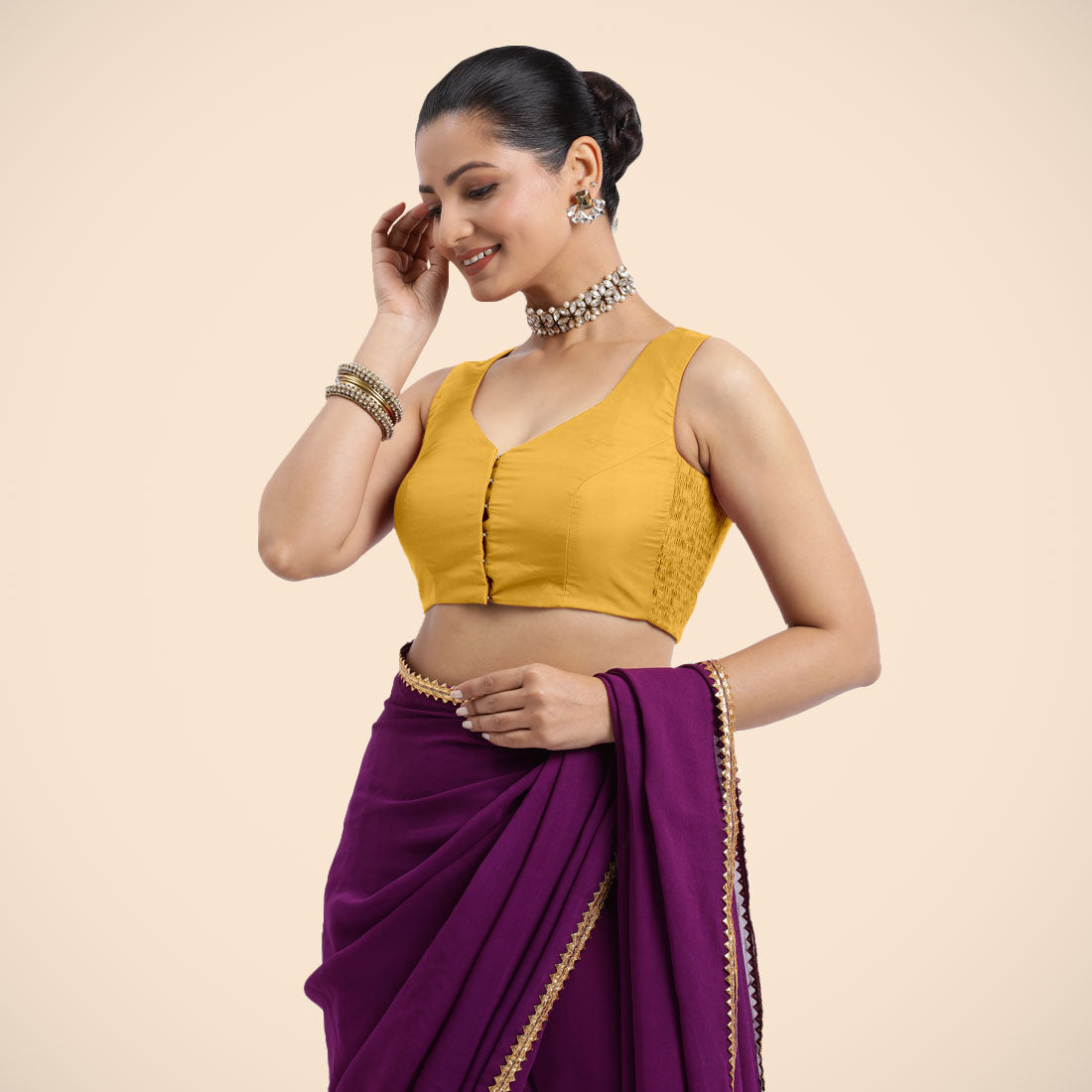Nazia x Rozaana Saree Blouse, in Yellow Artificial Silk, featuring sleeveless and curved v-neckline, made for daily & work.