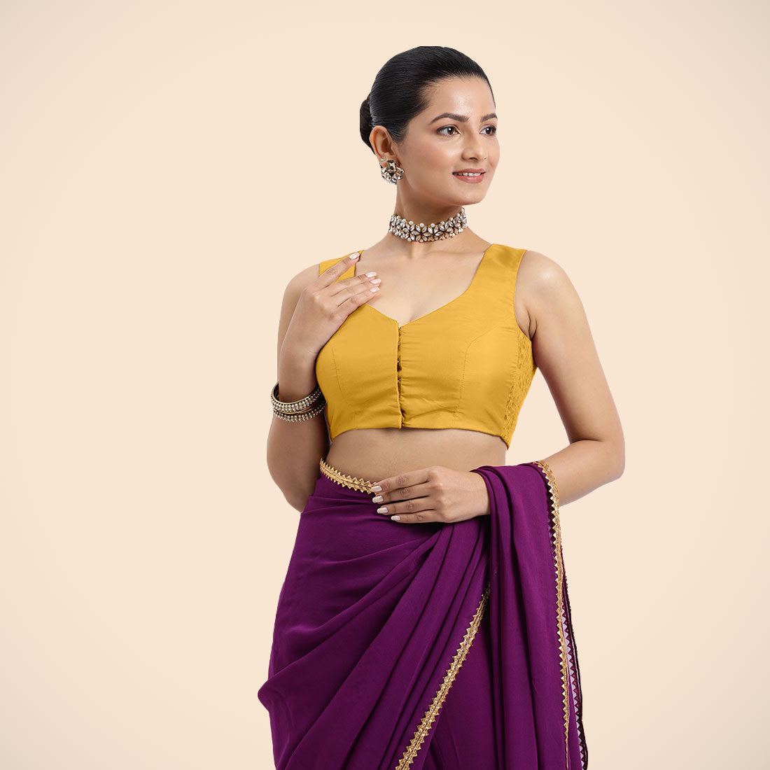 Nazia x Rozaana Saree Blouse, in Yellow Artificial Silk, featuring sleeveless and curved v-neckline, made for daily & work.