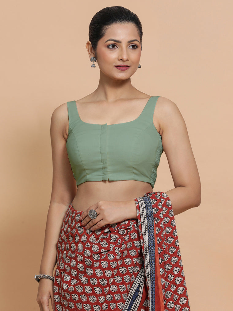 Nisha x Rozaana Saree Blouse, in Green Linen, featuring sleeveless and round neckline, made for daily & work.