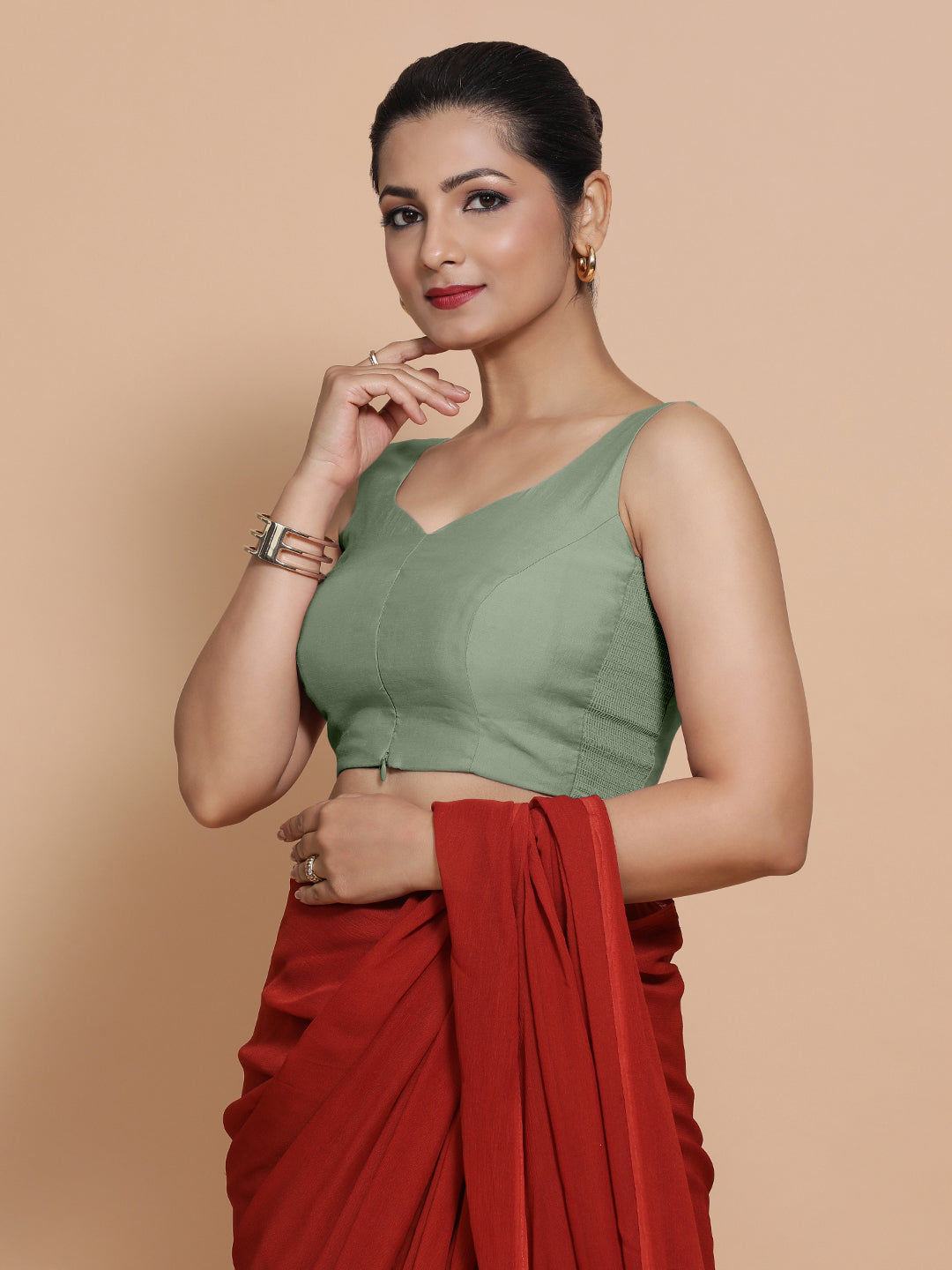 Nitya x Rozaana Saree Blouse, in Green Viscose, featuring sleeveless and sweetheart neckline, made for daily & work.
