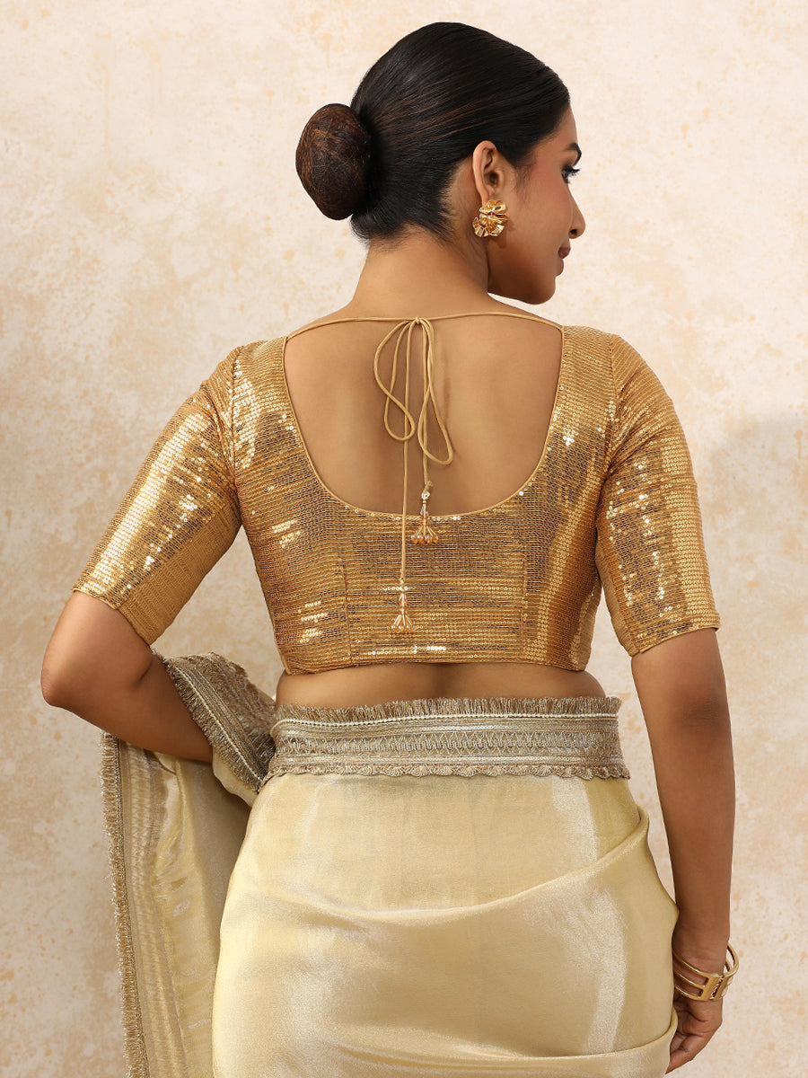 Noreen x Tyohaar Saree Blouse, in Gold Sequin Fabric, featuring elbow sleeves and round neckline, made for party & festive.