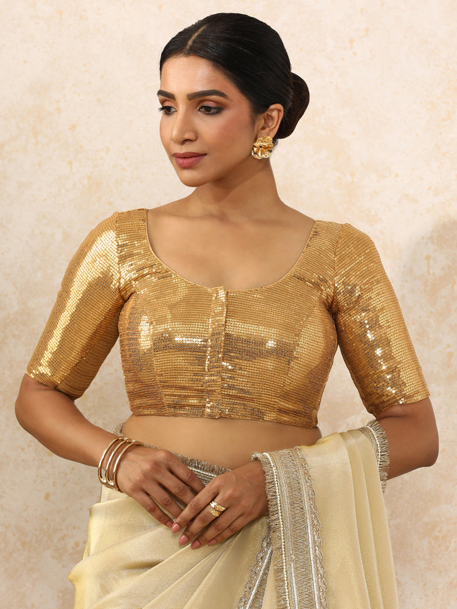 Noreen x Tyohaar Saree Blouse, in Gold Sequin Fabric, featuring elbow sleeves and round neckline, made for party & festive.