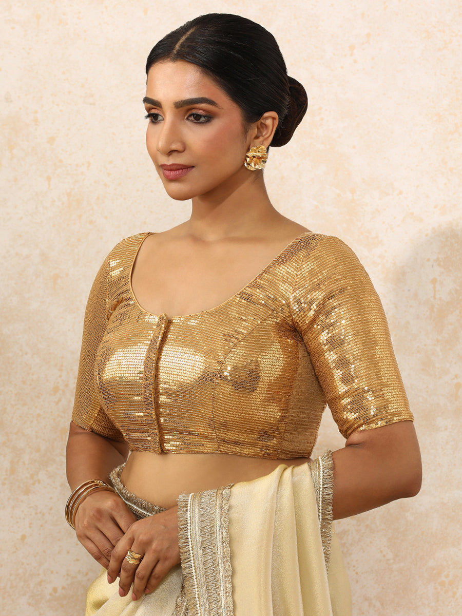 Noreen x Tyohaar Saree Blouse, in Gold Sequin Fabric, featuring elbow sleeves and round neckline, made for party & festive.