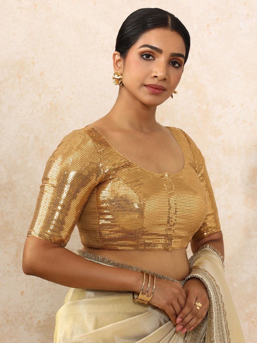 Noreen x Tyohaar Saree Blouse, in Gold Sequin Fabric, featuring elbow sleeves and round neckline, made for party & festive.