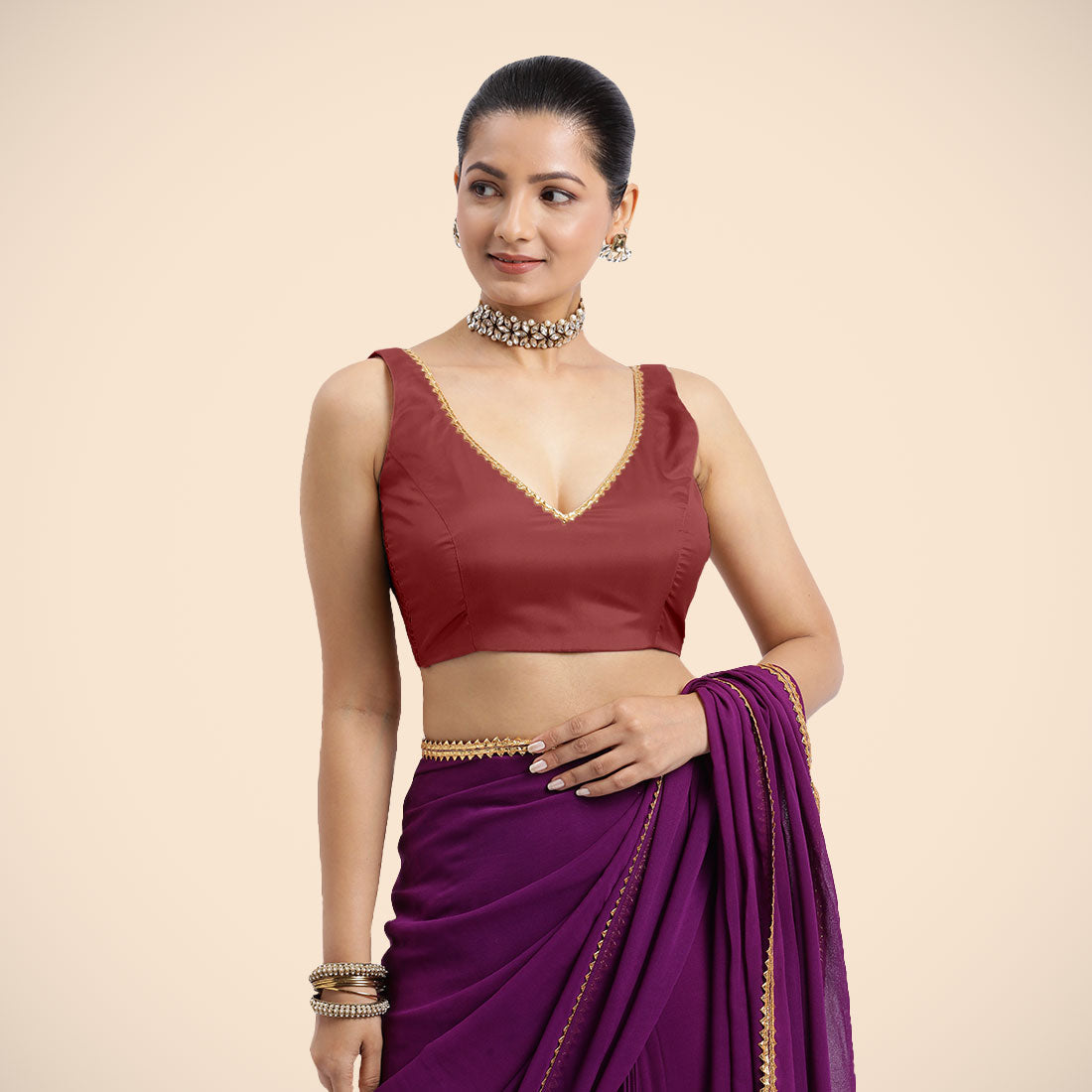 Raisa x Tyohaar Saree Blouse, in Red Vegan Silk, featuring sleeveless and curved v-neckline, made for party & festive.