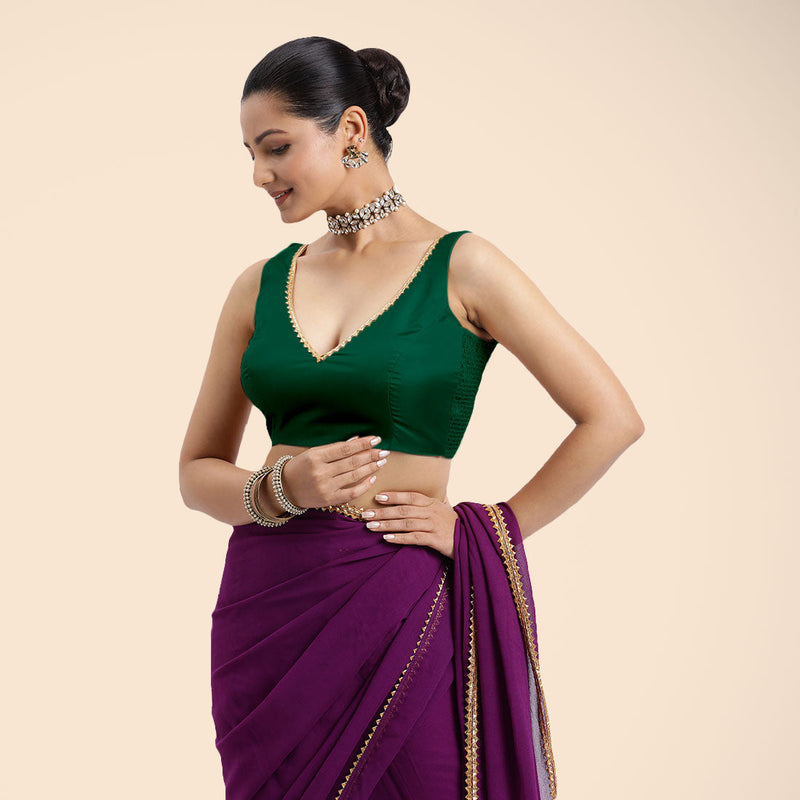 Raisa x Tyohaar | Bottle Green Sleeveless FlexiFit™ Saree Blouse with V Neckline with Golden Gota Lace Embellishment and Back Cut-out with Tie-Up-Binks