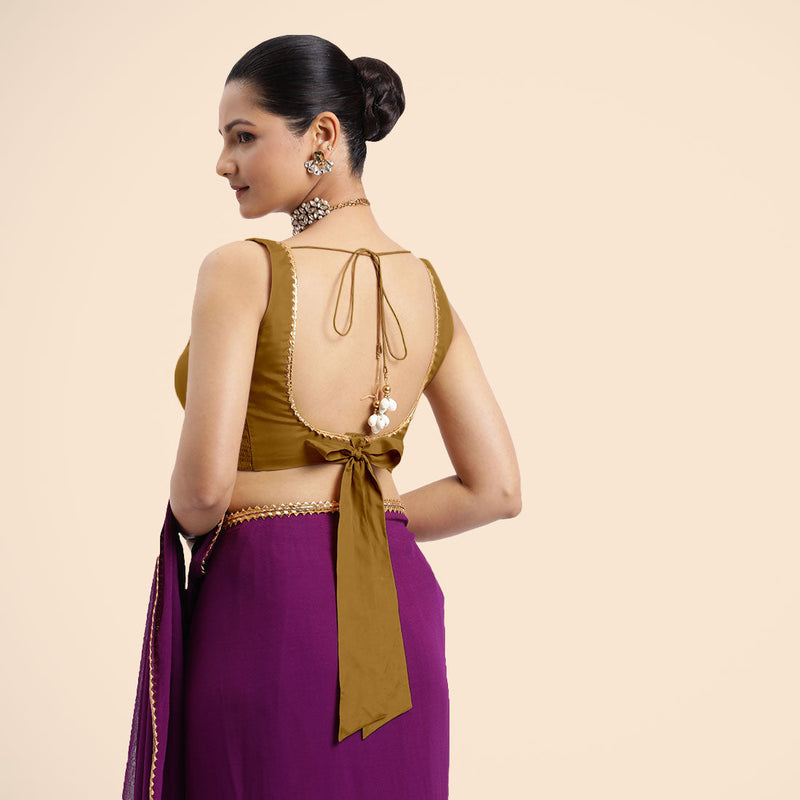 Raisa x Tyohaar | Bronze Gold Sleeveless FlexiFit™ Saree Blouse with V Neckline with Golden Gota Lace Embellishment and Back Cut-out with Tie-Up-Binks