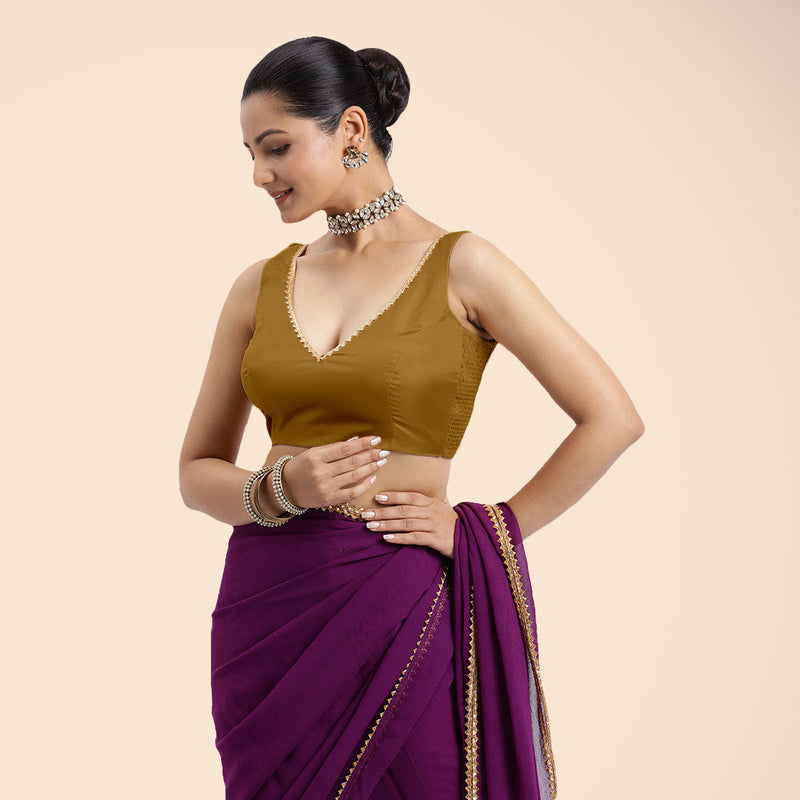 Raisa x Tyohaar | Bronze Gold Sleeveless FlexiFit™ Saree Blouse with V Neckline with Golden Gota Lace Embellishment and Back Cut-out with Tie-Up-Binks