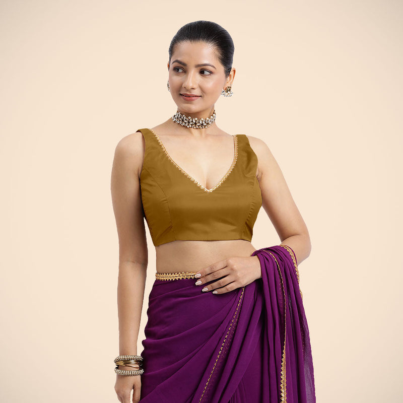 Raisa x Tyohaar | Bronze Gold Sleeveless FlexiFit™ Saree Blouse with V Neckline with Golden Gota Lace Embellishment and Back Cut-out with Tie-Up-Binks