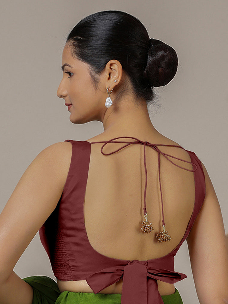 Raisa x Rozaana Saree Blouse, in Maroon Vegan Silk, featuring sleeveless and curved v-neckline, made for party & festive.