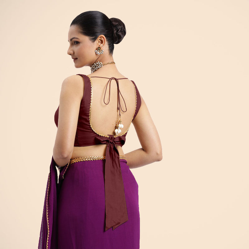 Raisa x Tyohaar | Burgundy Sleeveless FlexiFit™ Saree Blouse with V Neckline with Golden Gota Lace Embellishment and Back Cut-out with Tie-Up-Binks