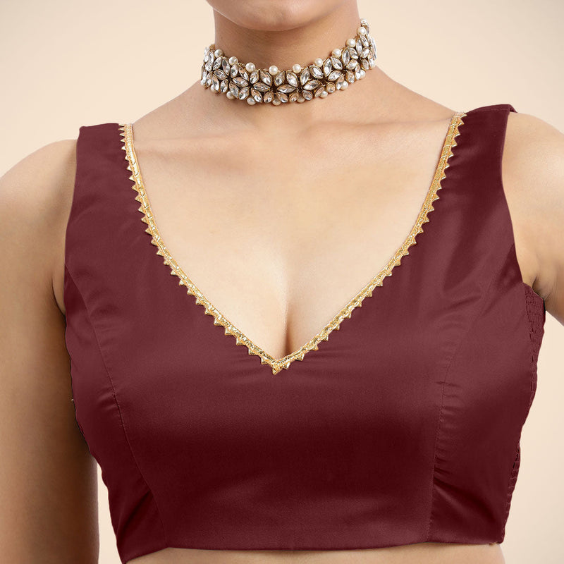 Raisa x Tyohaar | Burgundy Sleeveless FlexiFit™ Saree Blouse with V Neckline with Golden Gota Lace Embellishment and Back Cut-out with Tie-Up-Binks