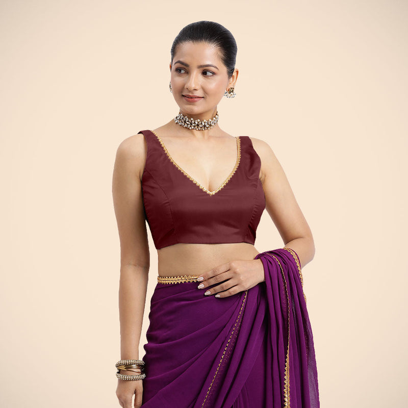 Raisa x Tyohaar | Burgundy Sleeveless FlexiFit™ Saree Blouse with V Neckline with Golden Gota Lace Embellishment and Back Cut-out with Tie-Up-Binks