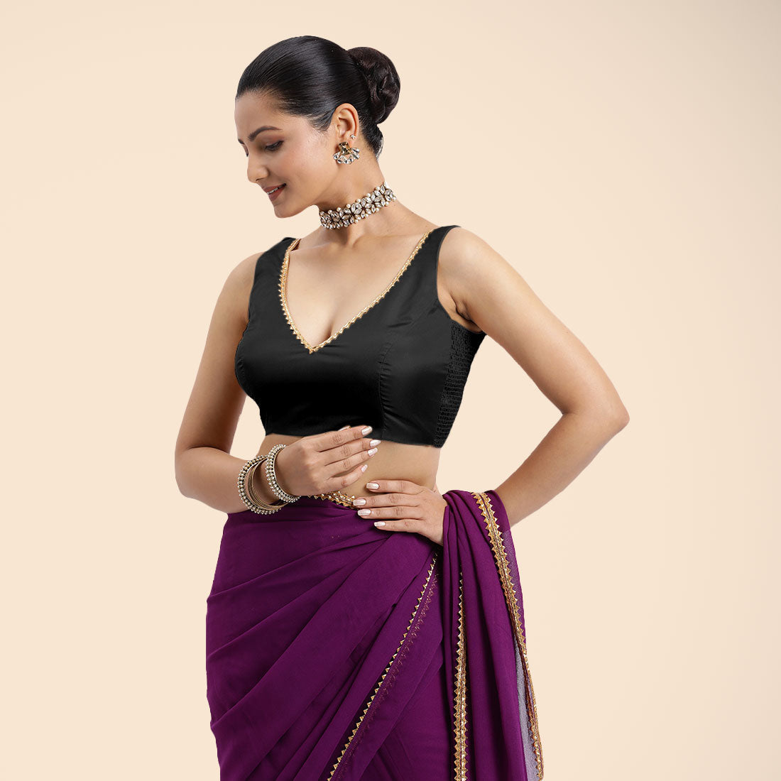Raisa x Tyohaar Saree Blouse, in Black Vegan Silk, featuring sleeveless and curved v-neckline, made for party & festive.