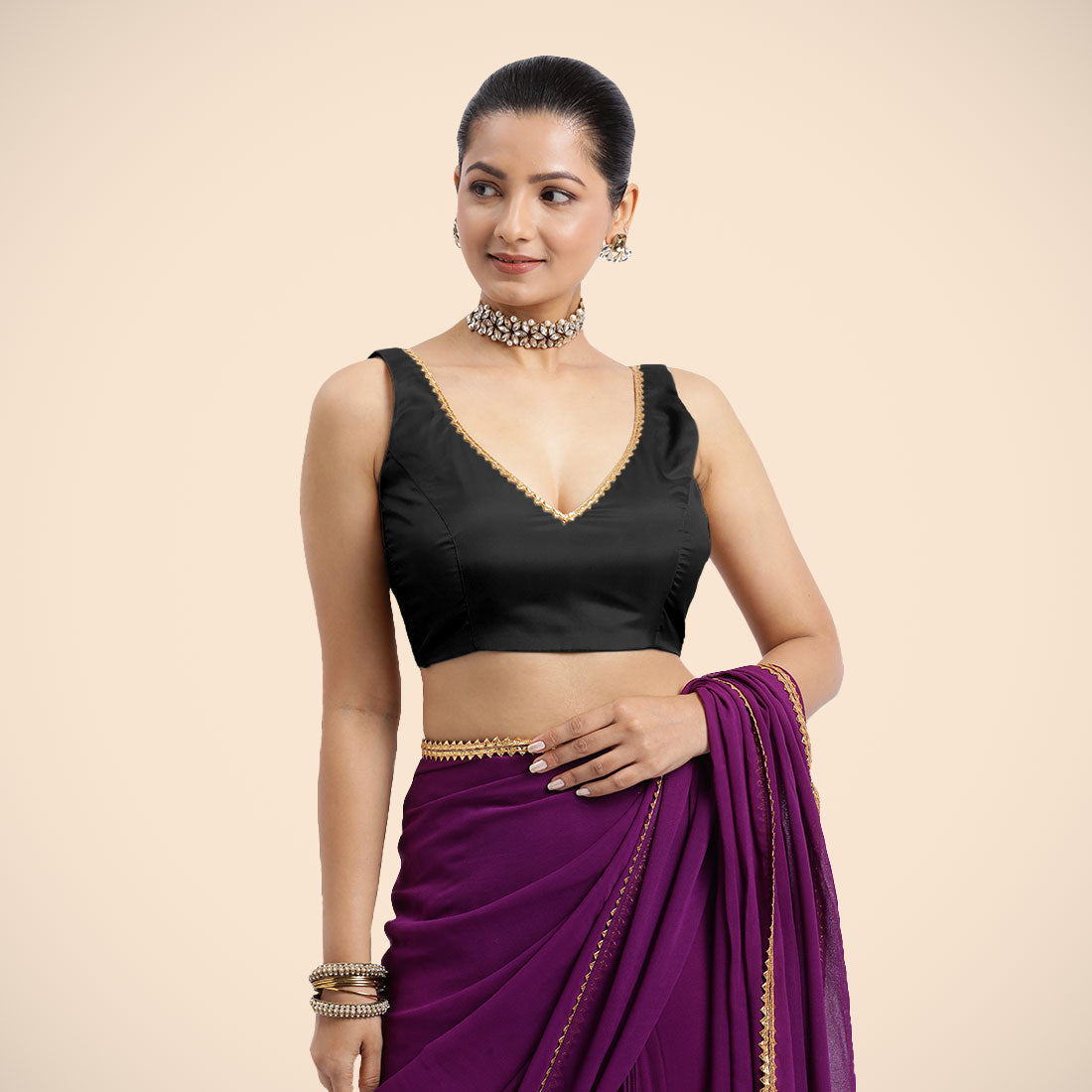 Raisa x Tyohaar Saree Blouse, in Black Vegan Silk, featuring sleeveless and curved v-neckline, made for party & festive.