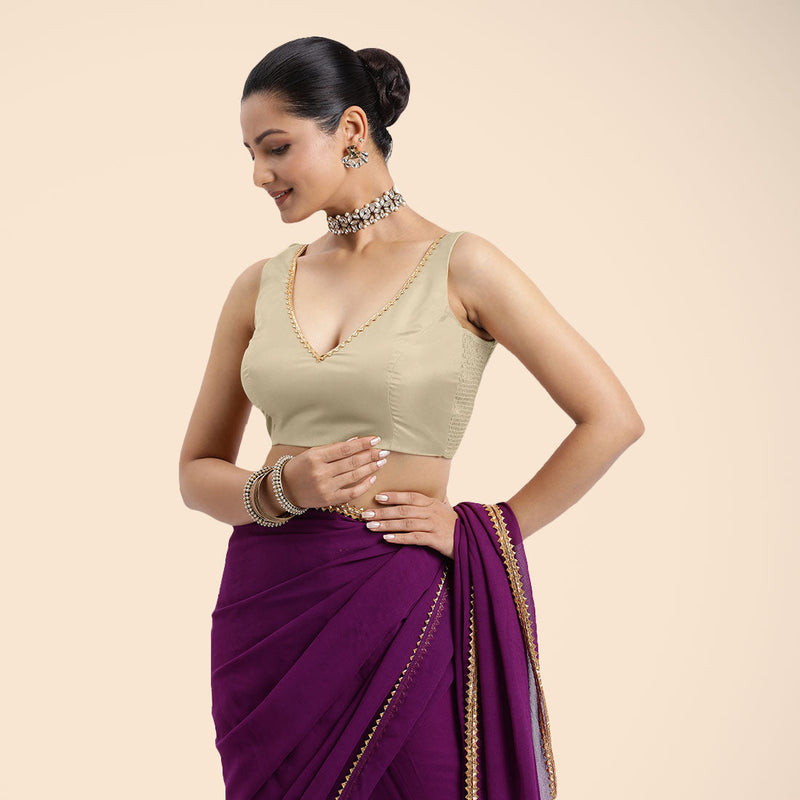 Raisa x Tyohaar | Cream Sleeveless FlexiFit™ Saree Blouse with V Neckline with Golden Gota Lace Embellishment and Back Cut-out with Tie-Up-Binks