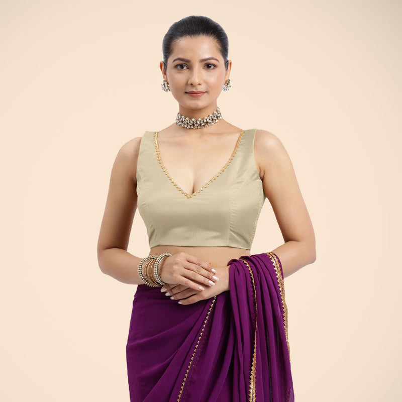 Raisa x Tyohaar | Cream Sleeveless FlexiFit™ Saree Blouse with V Neckline with Golden Gota Lace Embellishment and Back Cut-out with Tie-Up-Binks