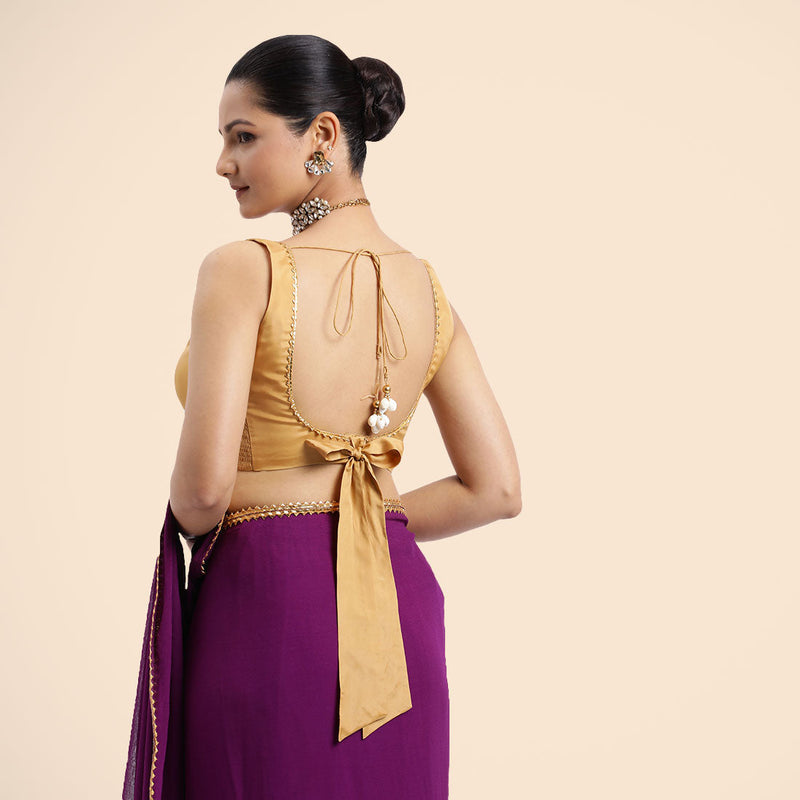 Raisa x Tyohaar | Gold Sleeveless FlexiFit™ Saree Blouse with V Neckline with Golden Gota Lace Embellishment and Back Cut-out with Tie-Up-Binks