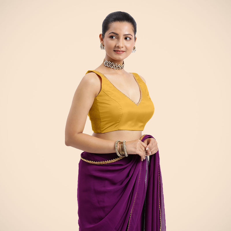 Raisa x Tyohaar | Sleeveless Marigold Yellow FlexiFit™ Gota Embellished Saree Blouse with Curved V-Neck-Binks